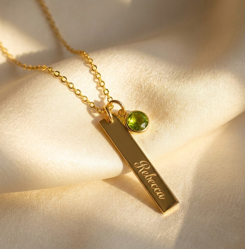 Personalized bar necklace with tiny birthstone charm engraved with a custom name on a delicate gold chain, minimalist personalized jewelry gift for her