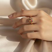 woman’s hand wearing the watermelon tourmaline oval bezel ring in rose gold vermeil, showing the delicate band and vibrant slice of tourmaline with pink to green gradient, perfect for October babies and gemstone lovers, stackable ring that pairs with other bands or wear solo, meaningful birthday or anniversary gift for her, available in sterling silver, gold or rose gold finish, artisan handcrafted birthstone jewelry.