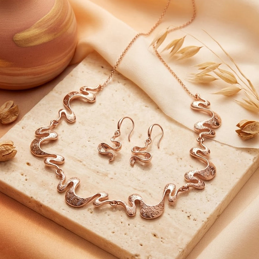 wave-necklace-rose-gold-set-earring_00fc3e5a-5e42-46bd-b734-0417c1191226.jpg