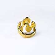 Back view of gold abstract waves ring against a white background. Ring is adjustable Size 7 and up. Model wears silver textured wave shaped ring on index finger. Stretchy ring, adjustable to fit ring, wave ring, nature inspired jewelry, boho jewelry, nature inspired ring, ocean ring, water ring, bohemian jewelry, zinc alloy, gold, silver, one size fits most, ring for her, mother's day git, christmas gift, gift for girlfriend
