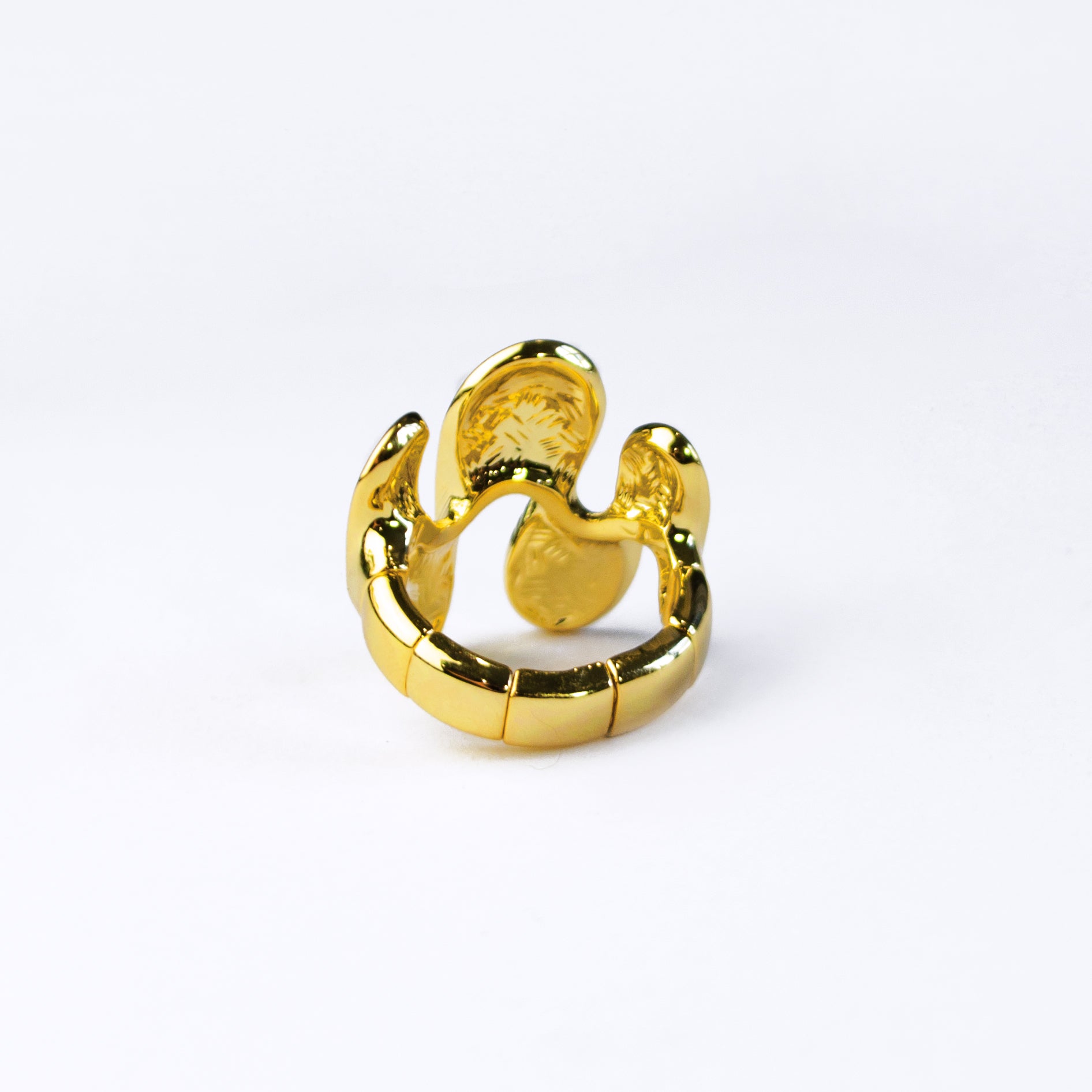 Back view of gold abstract waves ring against a white background. Ring is adjustable Size 7 and up. Model wears silver textured wave shaped ring on index finger. Stretchy ring, adjustable to fit ring, wave ring, nature inspired jewelry, boho jewelry, nature inspired ring, ocean ring, water ring, bohemian jewelry, zinc alloy, gold, silver, one size fits most, ring for her, mother's day git, christmas gift, gift for girlfriend