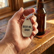 Personalized bottle opener keychain held in hand, featuring engraved stainless steel design with custom message. Practical engraved keychain gift for men, perfect for dads, husbands, groomsmen, or beer lovers.