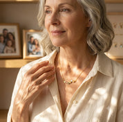Grandma wearing personalized birthstone and initial necklace
