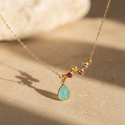 Custom birthstone necklace for mom with teardrop charm and kids birthstones in gold