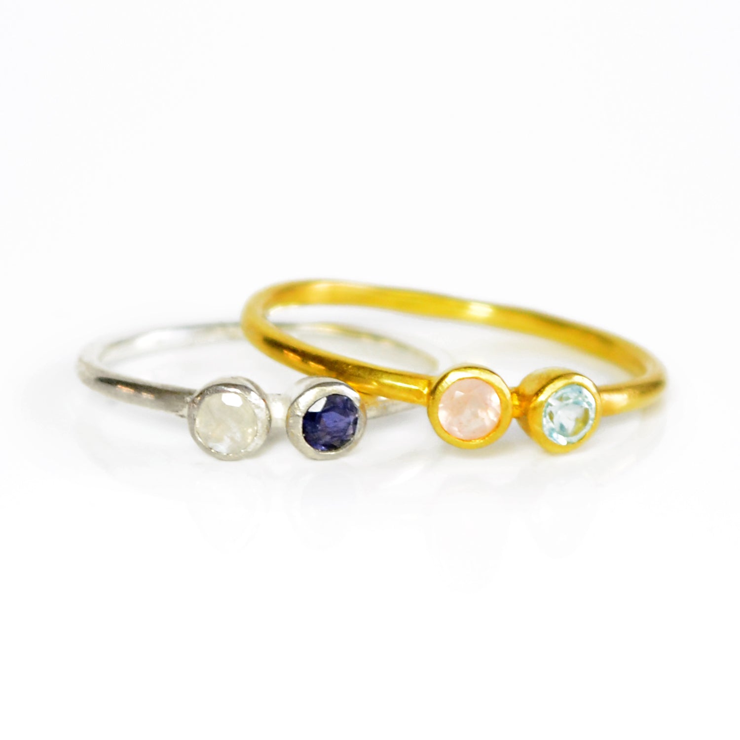 Yellow Gold duel ring featuring pink chalcedony, blue topaz birthstones and Sterling Silver Ring with moonstone and kyanite Birthstones