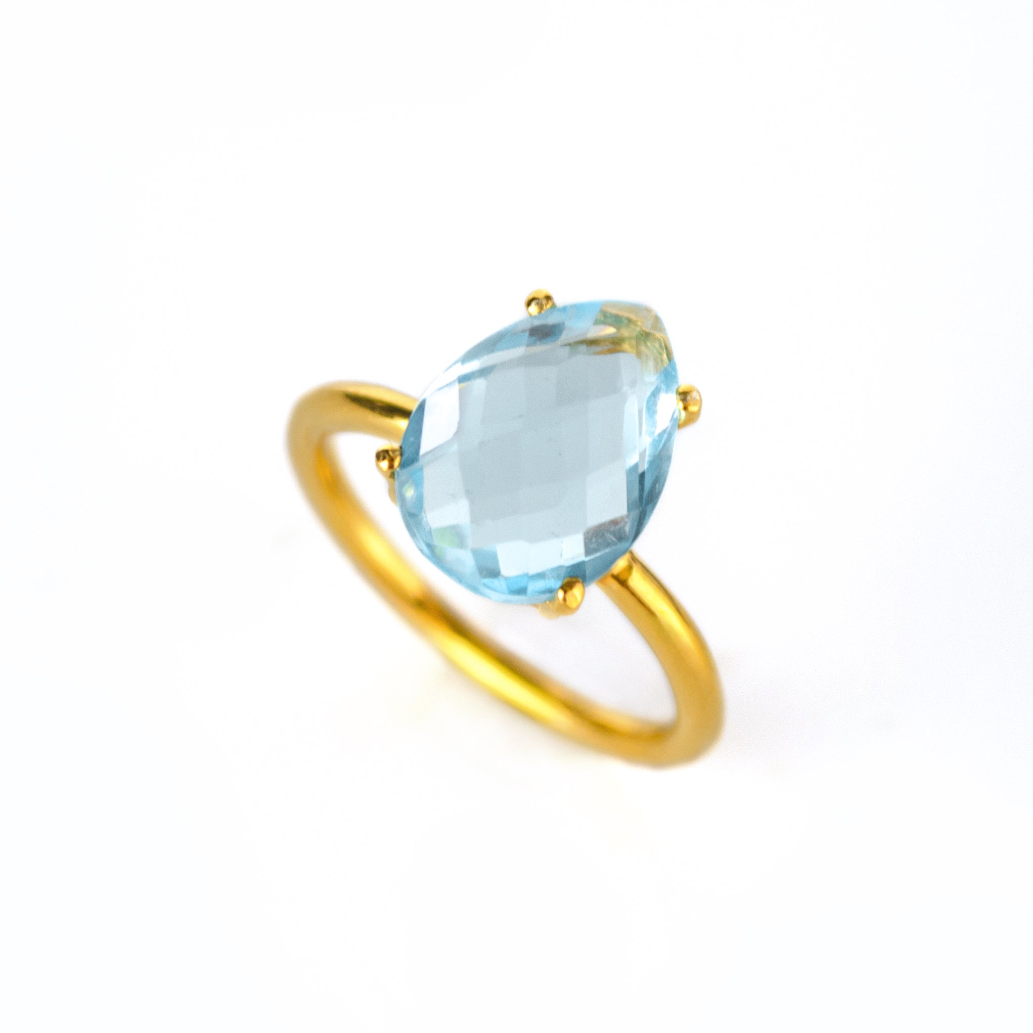 Blue-Topaz-prong-teardrop-gold-ring-0330.jpg
