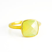 Peridot chalcedony gold plated cushion bezel square stacking ring on white background. August birthday, august gemstone square gemstone, green birthstone, sterling silver ring
