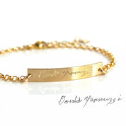 Single gold filled bar bracelet with custom handwriting engraved from a photo. 