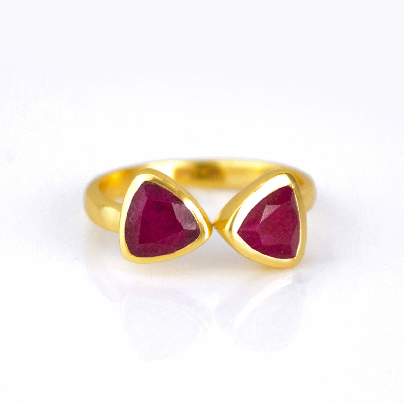Ruby triangle ring, adjustable Ruby ring, double triangle Ruby, personalized Ruby jewelry, sterling silver Ruby ring, gold Ruby ring, rose gold Ruby ring, unique Ruby gemstone, custom triangle-cut Ruby, elegant red gemstone ring, bespoke Ruby jewelry, chic Ruby accessory, Ruby stacking ring, adjustable gemstone ring, trendy triangle ring, custom Ruby gift, unique birthstone ring, Ruby jewelry, vibrant red Ruby ring