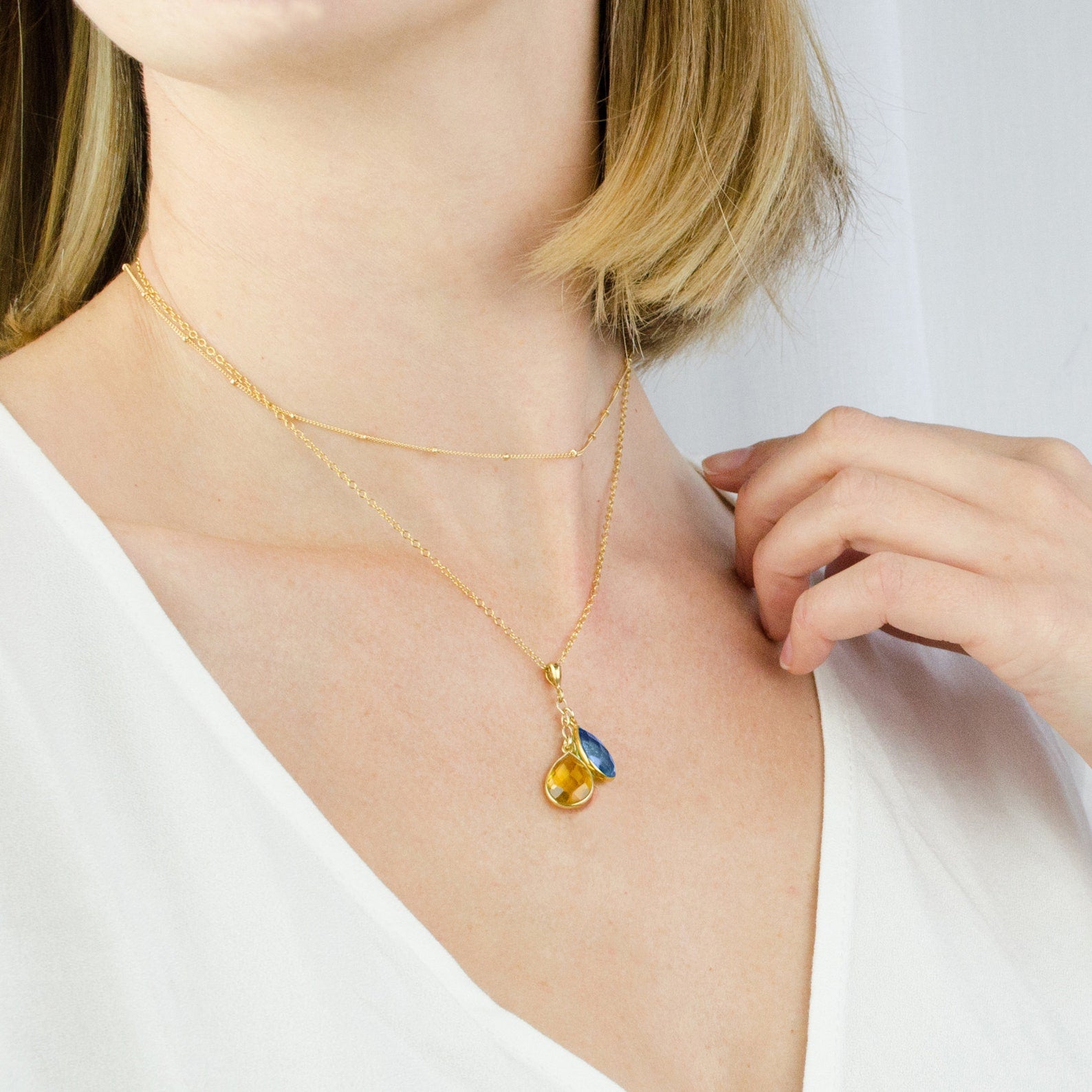 KyaniteandCitrineQuartzTeardropStonesUkrainianFlagSupportforUkrainePrayforUkraineSolidaritywithUkraineJewelry.jpg