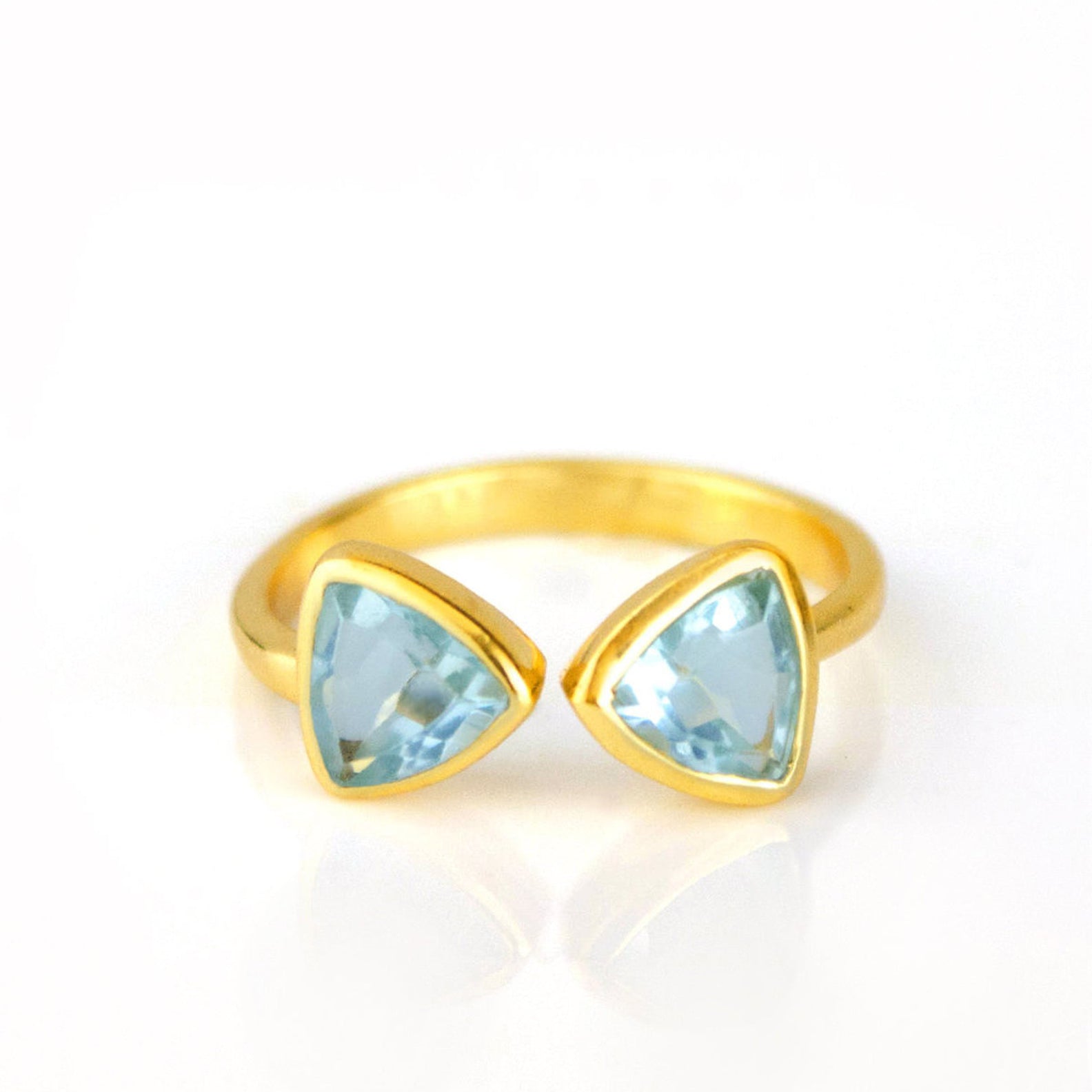 Blue Topaz gemstone ring, adjustable Blue Topaz ring, custom Blue Topaz jewelry, personalized Blue Topaz ring, sterling silver Blue Topaz ring, gold Blue Topaz ring, rose gold Blue Topaz ring, vibrant Blue Topaz gemstone, December birthstone ring, unique Blue Topaz jewelry, bespoke Blue Topaz ring, elegant blue gemstone, Blue Topaz stacking ring, trendy Blue Topaz accessory, custom birthstone ring, chic Blue Topaz design, Blue Topaz gift idea, custom blue gemstone ring