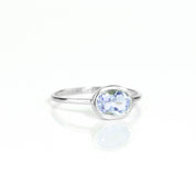 a sterling silver alexandrite ring shown on white background. stackable! Stacking rings, bezel set, small oval, tiny oval, dainty oval, birthstone rings, sterling silver stamp, birthstone ring, birthstone jewelry, purple gemstone, purple birthstone, june birthstone, june gemstone, stack set, stacking rings, gemstone ring, birthstone ring, mother's day gift for her, gift for mom, gift for fiance, gift for girlfriend, wedding jewelry, bridesmaid jewelry, anniversary jewelry, anniversary gift, birthday gift,