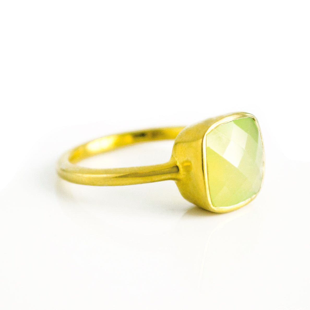 Peridot chalcedony gold plated cushion bezel square stacking ring on white background. August birthday, august gemstone square gemstone, green birthstone, sterling silver ring