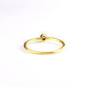 back view of a Single gold plated dainty 3mm Ruby gemstone ring. July  birthstone. On white background. 925 sterling silver, birthstone ring, stacking ring, stackable, birthstone jewelry, facet gemstone