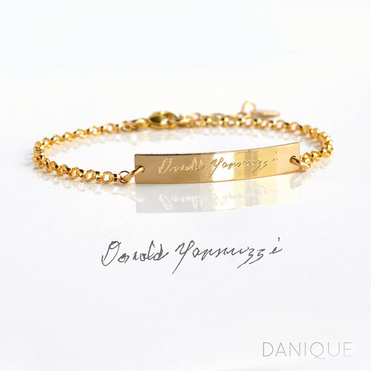 Single gold filled bar bracelet featuring an engraved signature from a photo. 