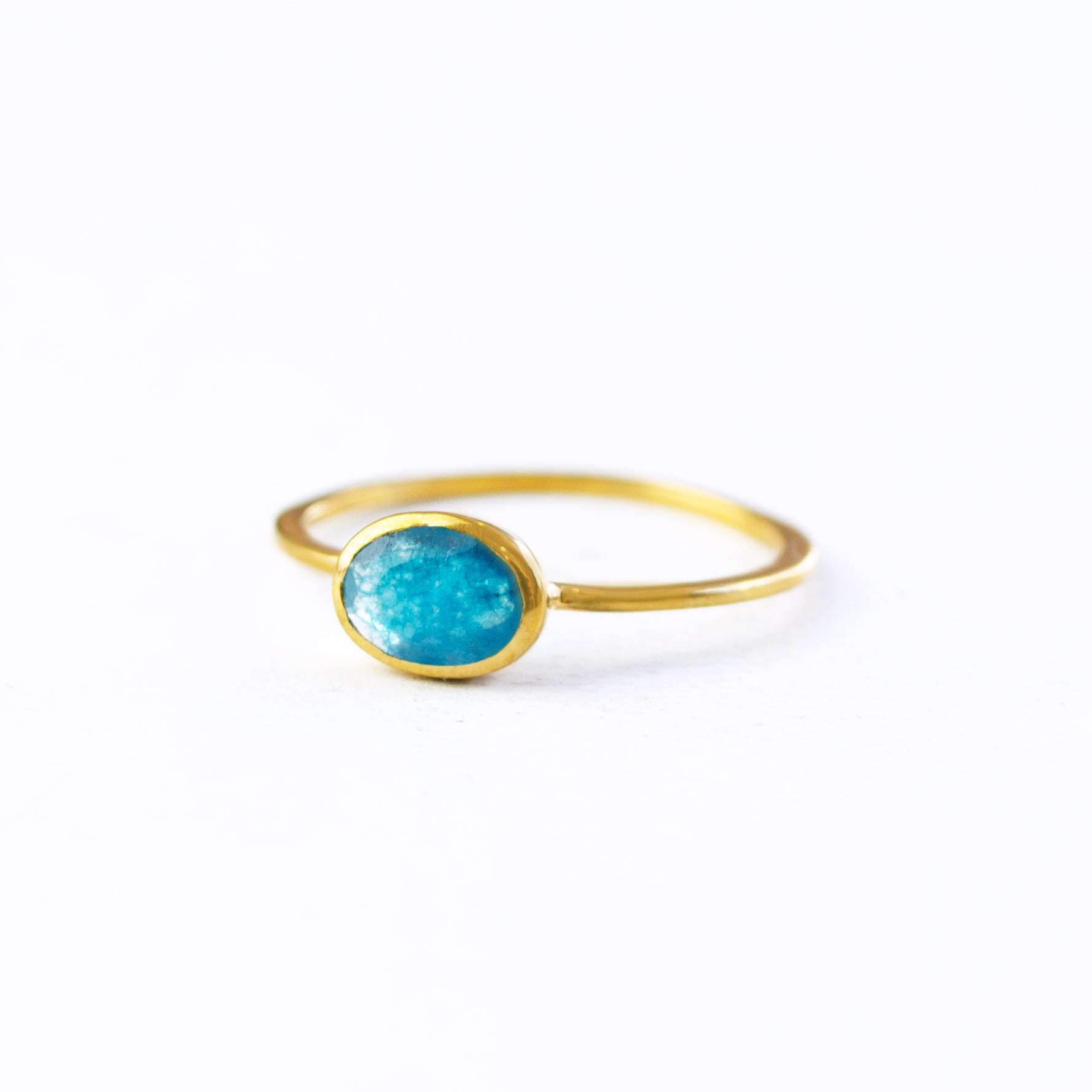 a gold blue black jade ring shown on white background. stackable! Stacking rings, bezel set, small oval, tiny oval, dainty oval, birthstone rings, sterling silver stamp, birthstone ring, birthstone jewelry