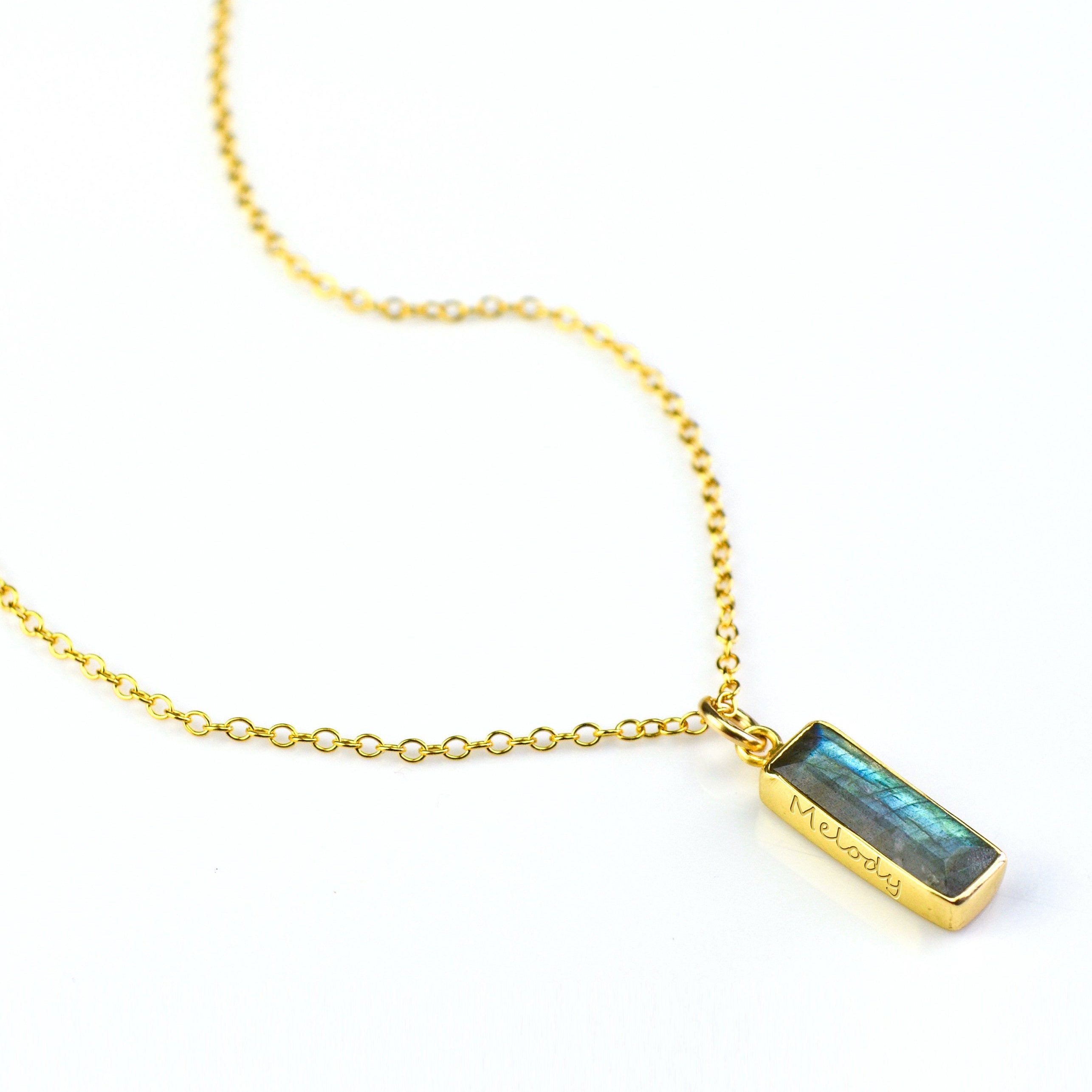 Vertical gold filled cable labradorite gemstone bar adira series necklace with secret engraving on white background