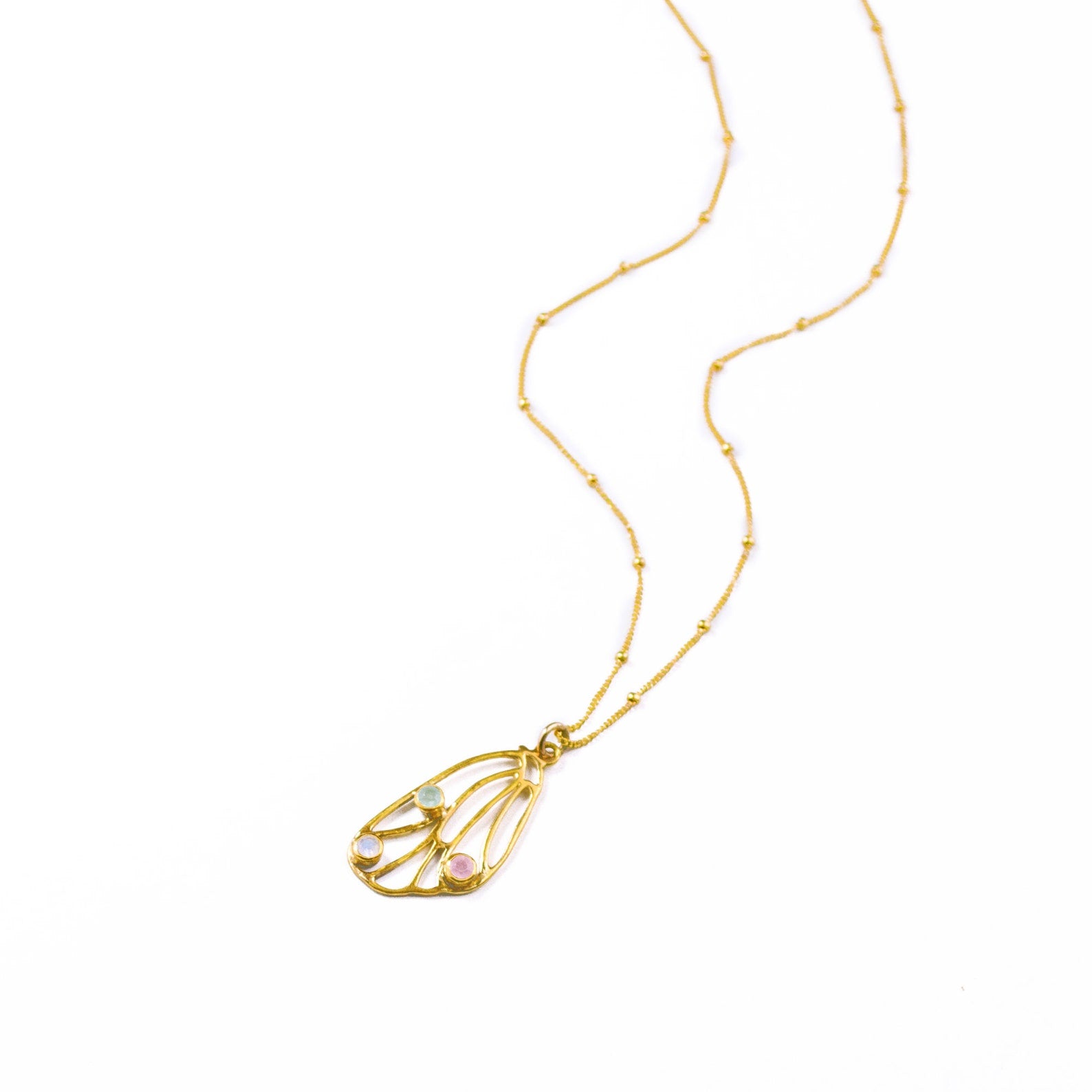 Butterfly pendant wing birthstone necklace in gold plated on a satellite chain with aqua chalcedony, pink chalcedony and moonstone birthstones. Birthstone necklace, birthstone jewelry, sterling silver, dainty gemstones