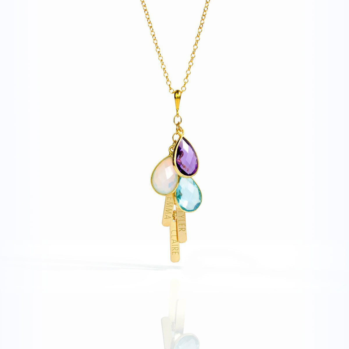 Single gold filled cable chain cascade birthstone necklace and tiny name tags with purple amethyst, moonstone and blue topaz stones. 