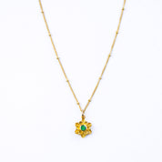 Single old filled satellite chain mothers bloom necklace with green onyx birthstone on white background. Gift for mom.