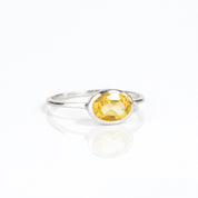 sterling silver small oval citrine birthstone ring november birthstone ring on white background