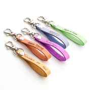 leather loop keychains with custom personalized engraving. For bridesmaids, groomsman, graduate, or any celebration
