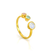 A multi birthstone ring for mom of two featuring one large 5mm bezel-set birthstone and two small 3mm child stones on an adjustable open band in gold vermeil. This custom family ring is designed as a meaningful gift for mom, perfect for celebrating children, birthdays, Mother’s Day, or a new baby. The dainty personalized bezel-set gemstone arrangement highlights your family story in elegant handmade jewelry she can wear every day.