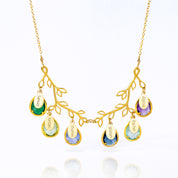 Tree branch necklace in gold filled with full engraved names on oval tags and prong set green onyx, green amethyst, alexandrite, kyanite, blue topaz or purple amethyst birthstones.