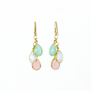  This drop earring design features tiny pear-shaped birthstones that cascade down to form a unique family birthstone style earring set. Pair in gold with 3 tiny teardrop stones in aqua chalcedony, moonston, and pink chalcedony