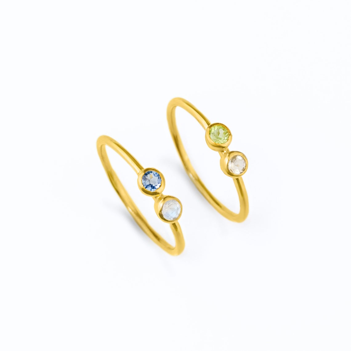 Two gold filled dual 3mm birthstone rings featuring kyanite and moonstone and peridot and clear quartz