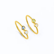 Two gold filled dual 3mm birthstone rings featuring kyanite and moonstone and peridot and clear quartz