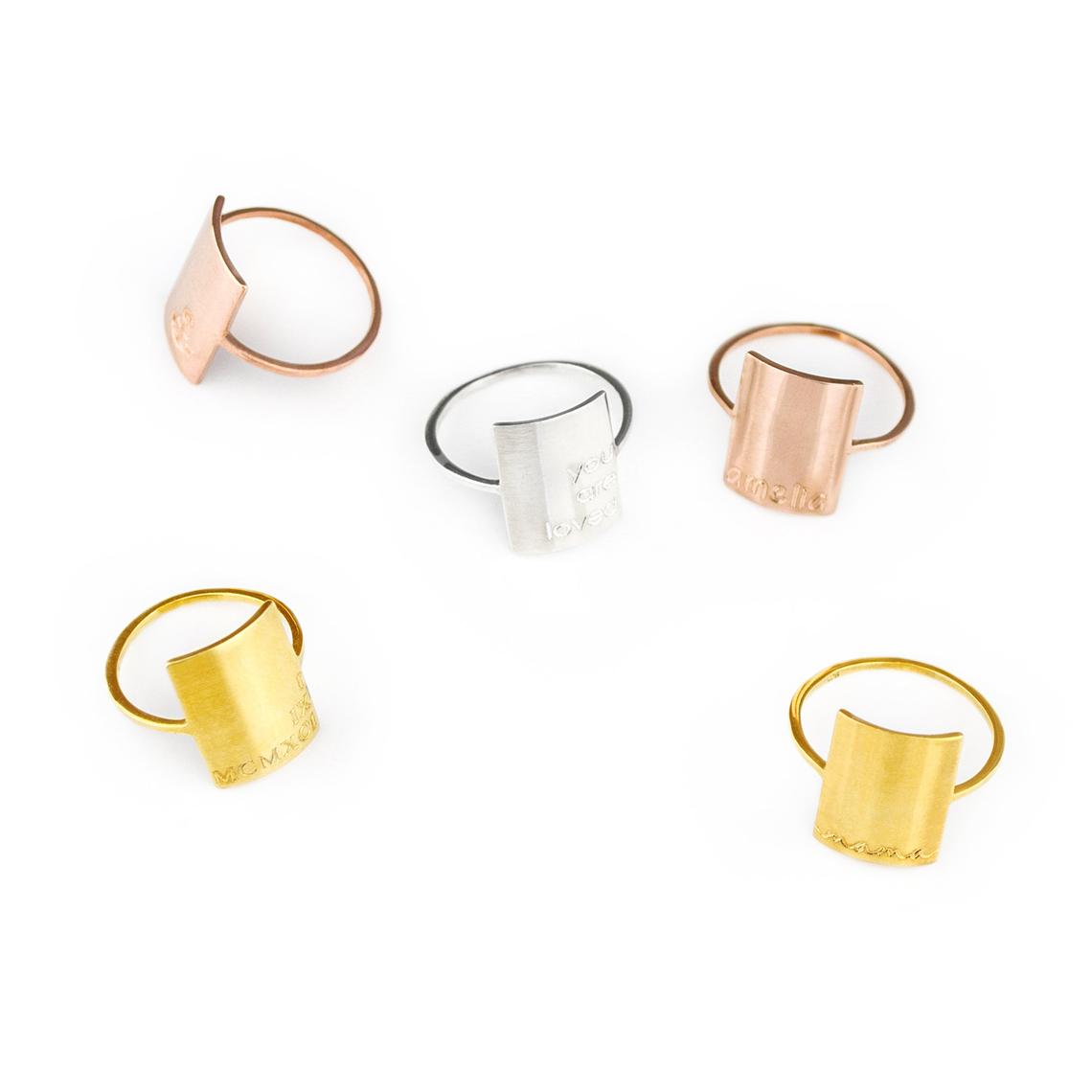 Gold plated, rose gold plated and sterling silver engraved plate rings, rectangle plate. Choose from our font styles to engrave a name, initials, date, roman numerals, symbol or short phrase. On white background