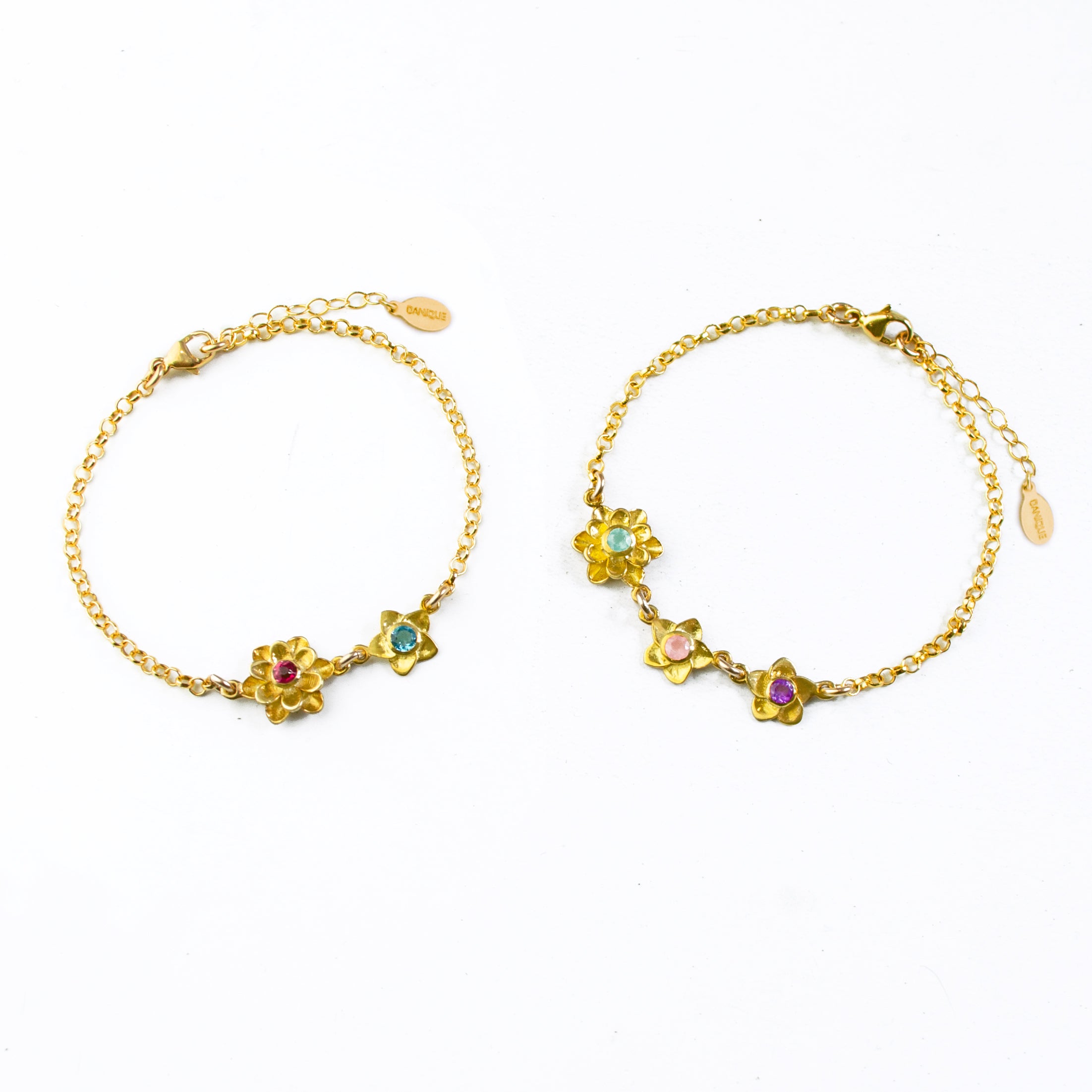 Two gold filled bloom bracelets. Mother of one bracelet on the left with ruby and kyanite birthstones. Mother of two on the right with aqua chalcedony, pink chalcedony and purple amethyst birthstones. 