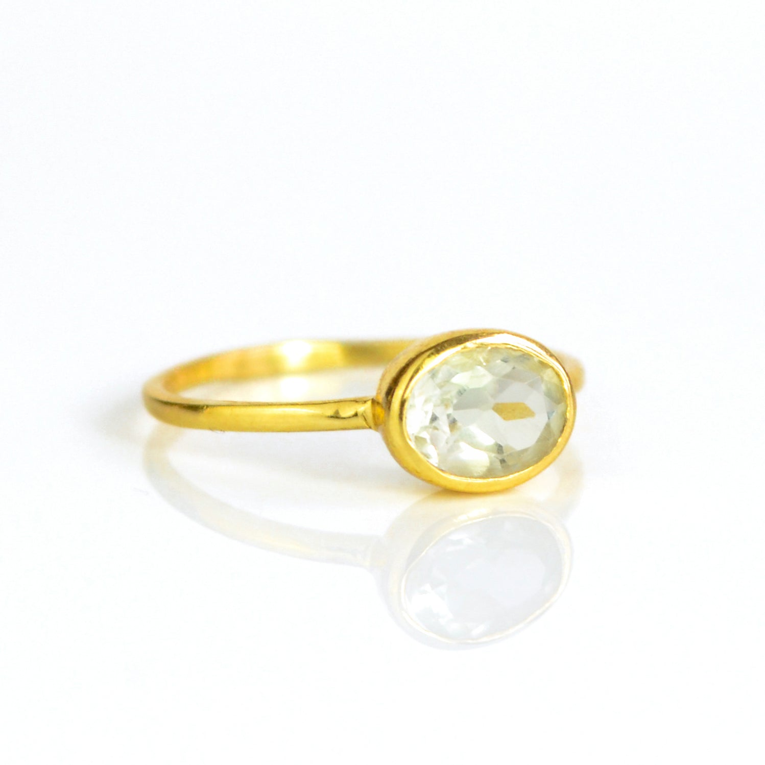 a gold green amethyst ring shown on white background. green gemstone, green birthstone, february birthstone, february gemstone, stack set, stacking rings, gemstone ring, birthstone ring, mother's day gift for her, gift for mom, gift for fiance, gift for girlfriend, wedding jewelry, bridesmaid jewelry, anniversary jewelry, anniversary gift, birthday gift, christmas gift, valentine's day gift, valentine's day rings, dainty ring, cocktail ring, statement ring, bezel set