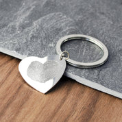 Engrave couples fingerprints into the heart shaped keychain. Perfect gift for Mother's Day, Father's Day, Anniversaries, Valentine's Day, Birthday or any holiday.
