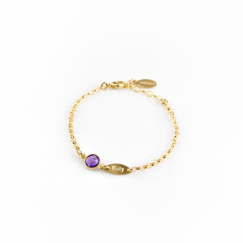 Gold filled birthstone bracelet with purple amethyst and engraved marquis tag with katy on it. This bracelet is adjustable with a lobster clasp.
