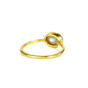 a rear view of the gold labradorite ring shown on white background. stackable! Stacking rings, bezel set, small oval, tiny oval, dainty oval, birthstone rings, sterling silver stamp, birthstone ring, birthstone jewelry, iridescent gemstone, gray birthstone