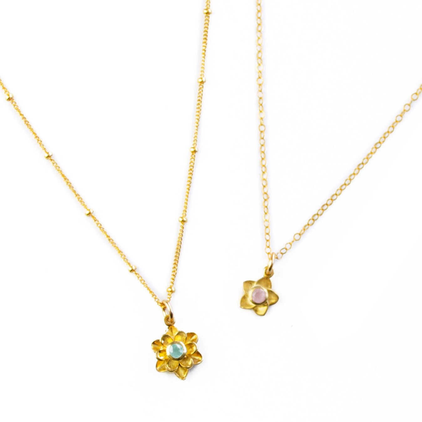 Mother and daughter necklace set bloom collection. Mother's gold filled necklace has a satellite chain and aqua chalcedony birthstone. Daughter's gold filled necklace is a cable chain and pink chalcedony birthstone. 