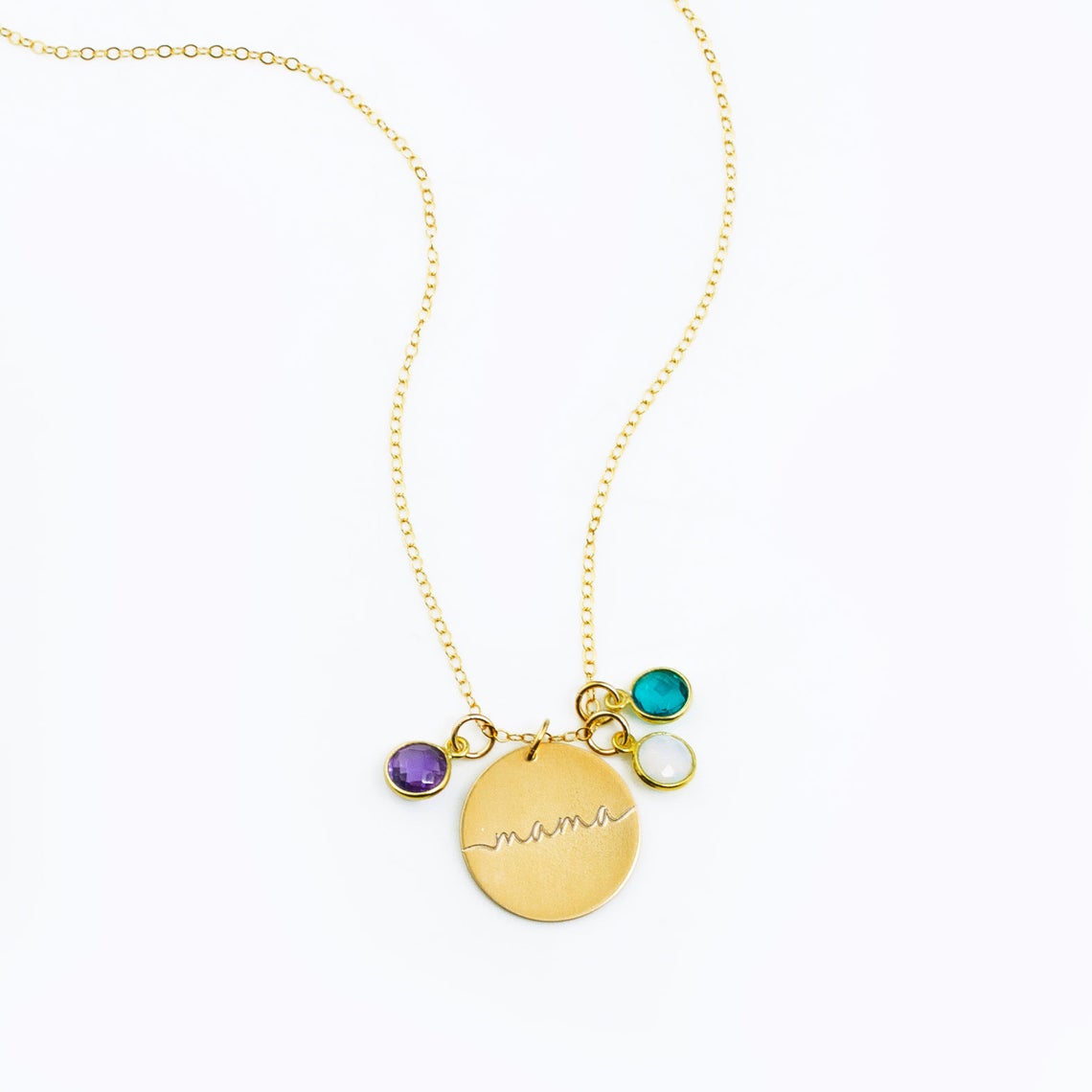 Single gold filled mama necklace with three birthstones including purple amethyst, moonstone and kyante. 