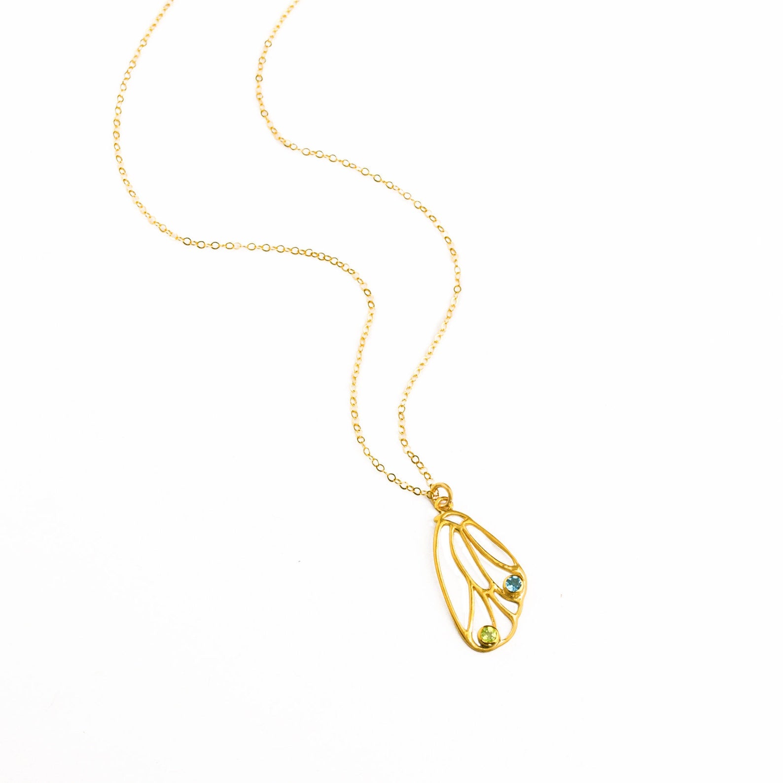 Butterfly pendant wing birthstone necklace in gold plated with cable chain and peridot and iolite birthstones. Birthstone necklace, birthstone jewelry, sterling silver, dainty gemstones
