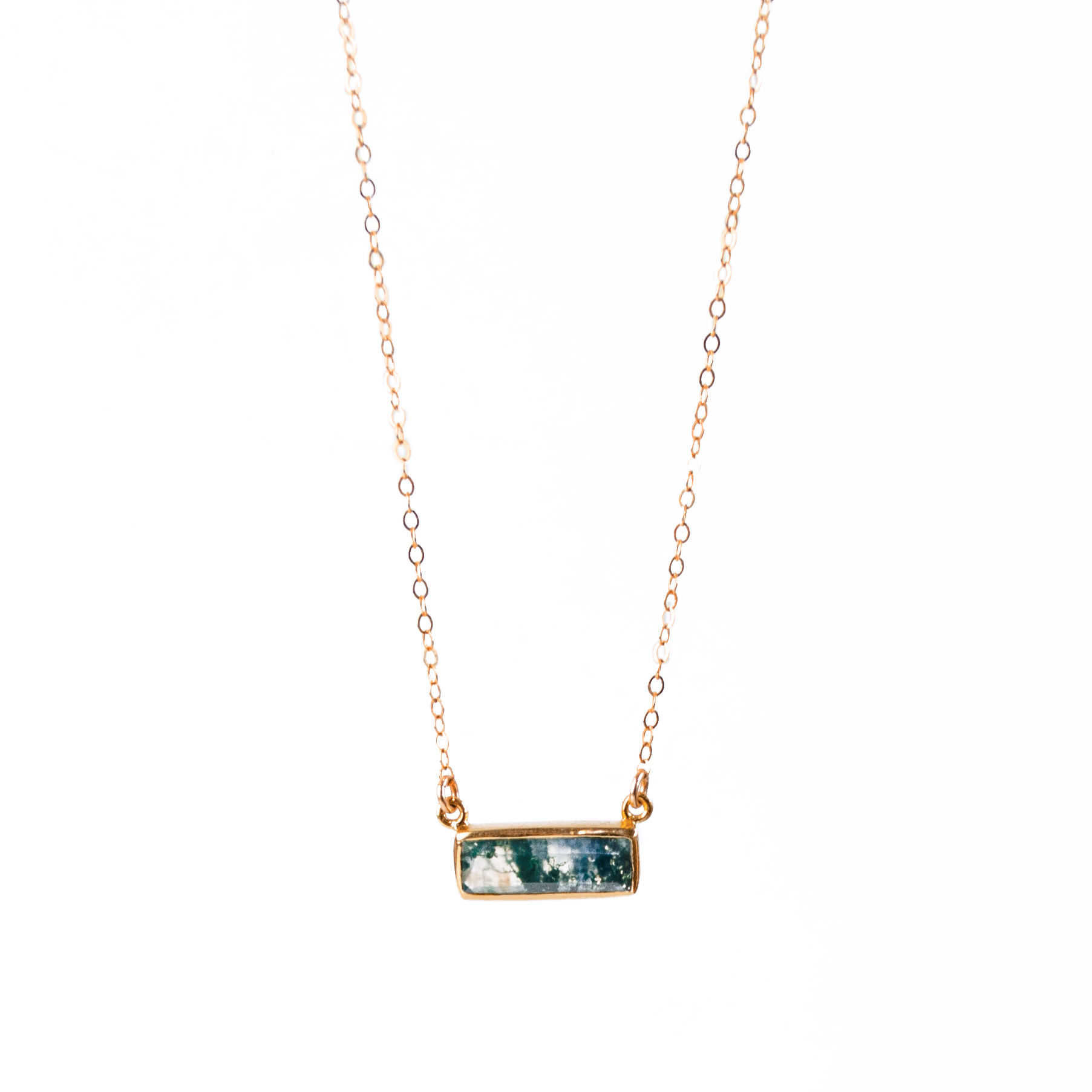 Single rode gold filled cable chain with horizontal moss agate adira bar necklace on white background