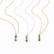 Single rose gold filled satellite chain with vertical moss agate adira bar necklace; Single sterling silver cable chain with vertical moss agate adira bar necklace, Single gold filled satellite chain with vertical moss agate adira bar necklace on white background