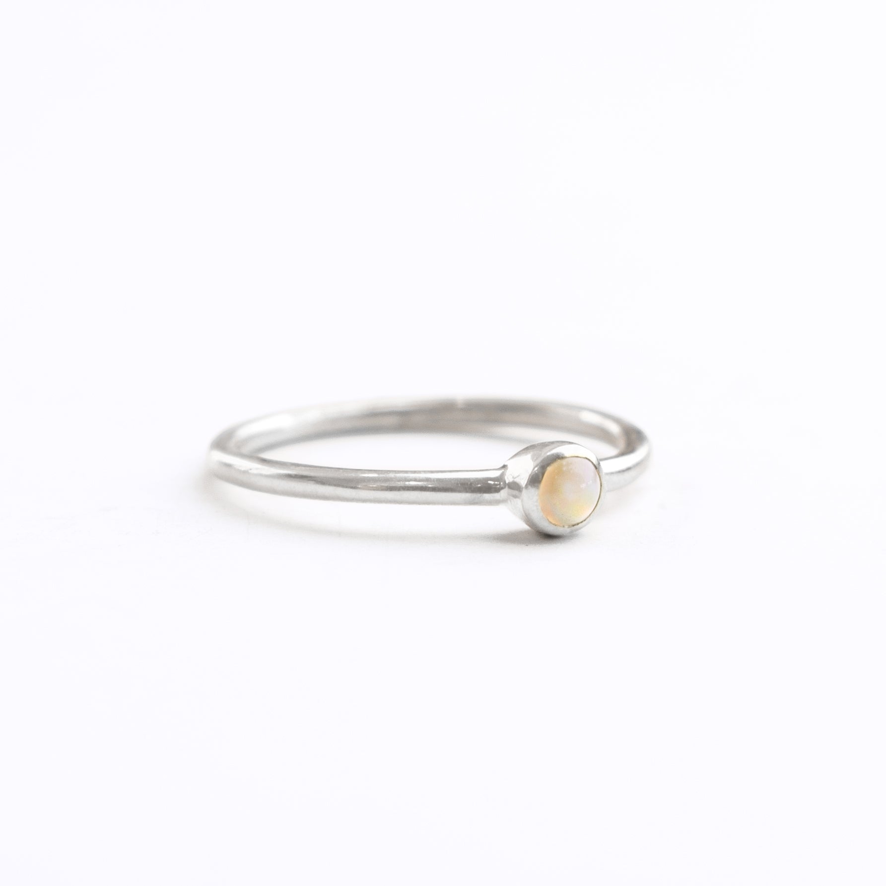 opalite-3mm-cabochon-ring-silver_85a9b480-959f-4c25-bb98-d97bcea5b98e.jpg