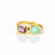 a gold aqua chalcedony ring with purple amethyst shown on white background. Stacking rings, bezel set, small oval, tiny oval, dainty oval, birthstone rings, sterling silver stamp, birthstone ring, birthstone jewelry, march birthstone, march gemstone, stack set, stacking rings, gemstone ring, birthstone ring, mother's day gift for her, gift for mom, gift for fiance, gift for girlfriend, wedding jewelry, bridesmaid jewelry, anniversary jewelry, anniversary gift, birthday gift, christmas gift, valentine's day 