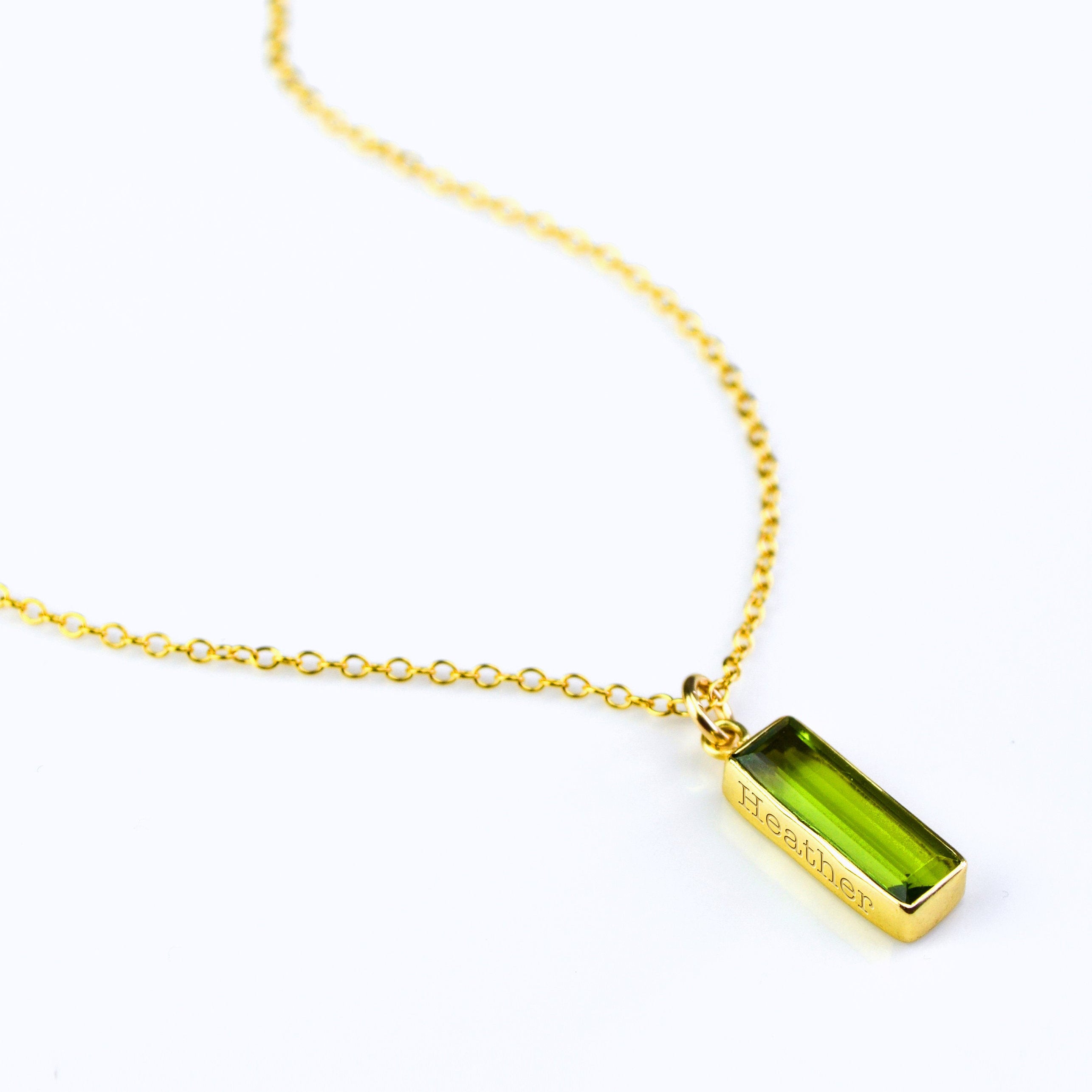 Single vertical gold filled cable chain peridot august birthstone necklace with secret message engraved.
