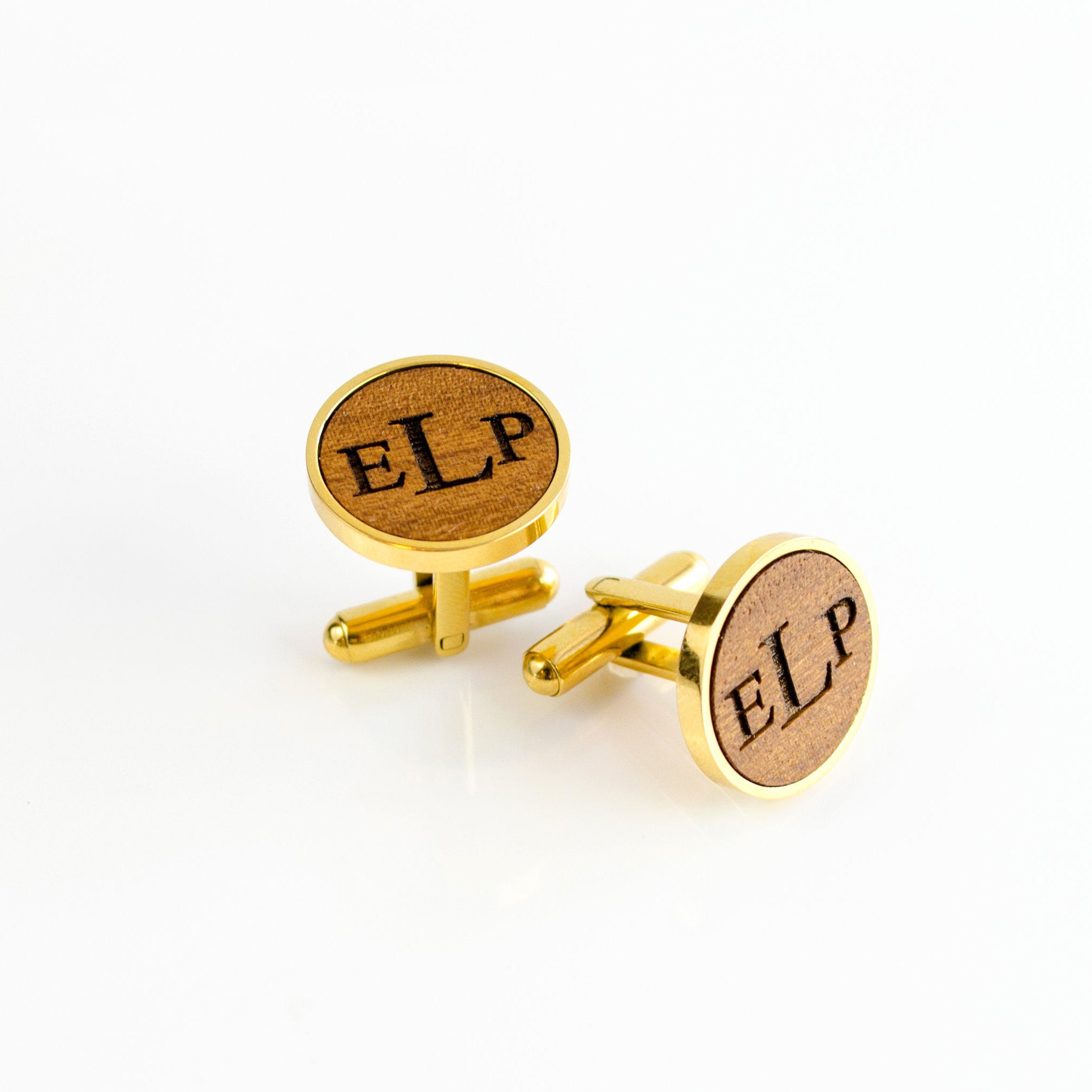 Custom engraved cufflinks on real mahogany wood with our timeless monogram. Customize cufflinks for a graduate, new promotion, prom, formal events, groomsman or wedding party gifts. gift ready. mens anniversary gifts, gifts for men, christmas gifts for him, valentine's day gifts for men, gift for husband, gift for fiance, father's day gift, birthday gift, wedding anniversary gift, wedding party gift, father of the groom gift, father of the bride gift, wood anniversary