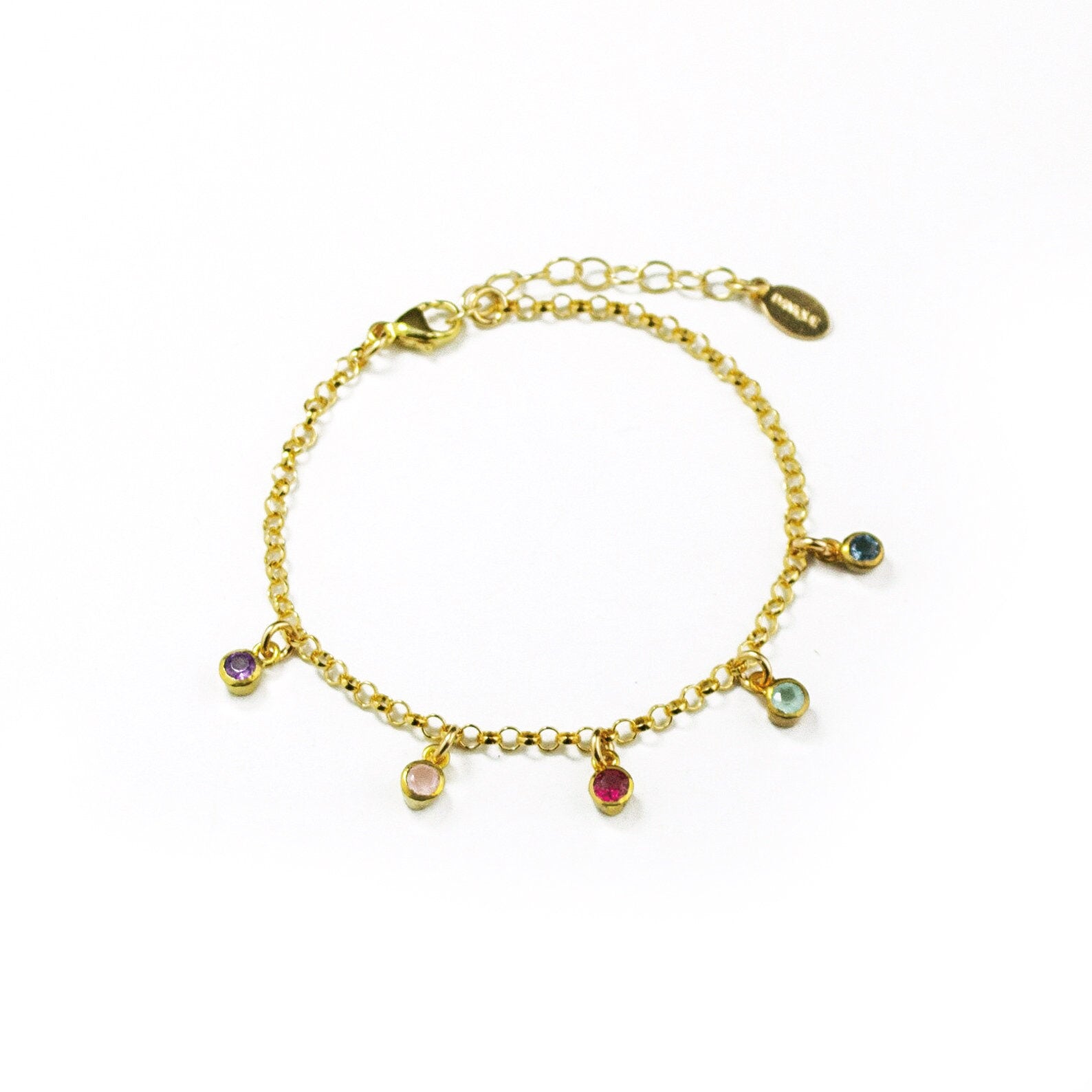 Single gold-filled dangle five stone birthstone bracelet, adjustable bracelet chain with purple amethyst, pink chalcedony, garnet, aqua chalcedony, and iolite. 