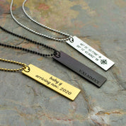 Collection of rectangle memorial tag necklaces in black with roman numerals, silver with a compass and coordinates or gold with a special save the date engraved