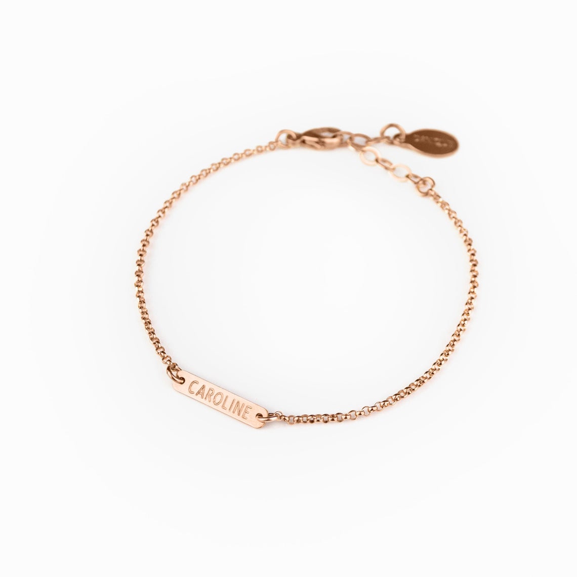 rosegoldtinybarbracelet.jpg