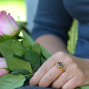 Model wearing Black Rutilated Quartz gold plated cushion bezel square stacking ring 